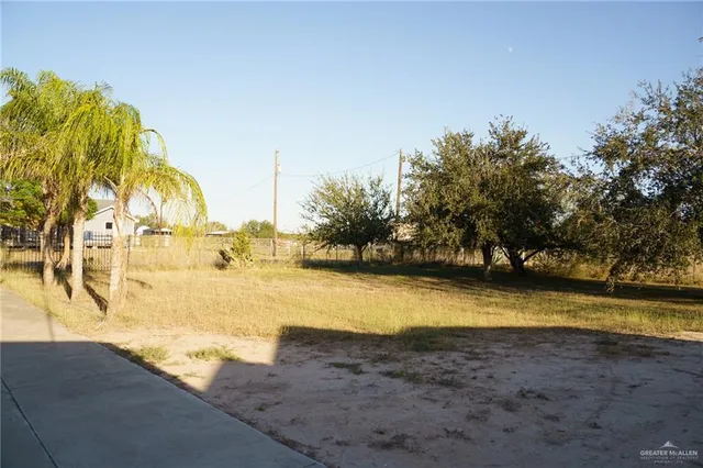 a view of a swimming pool and an outdoor space