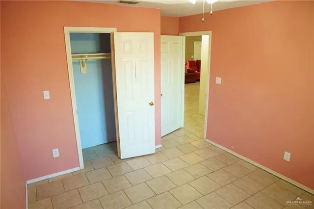 an empty room with closet