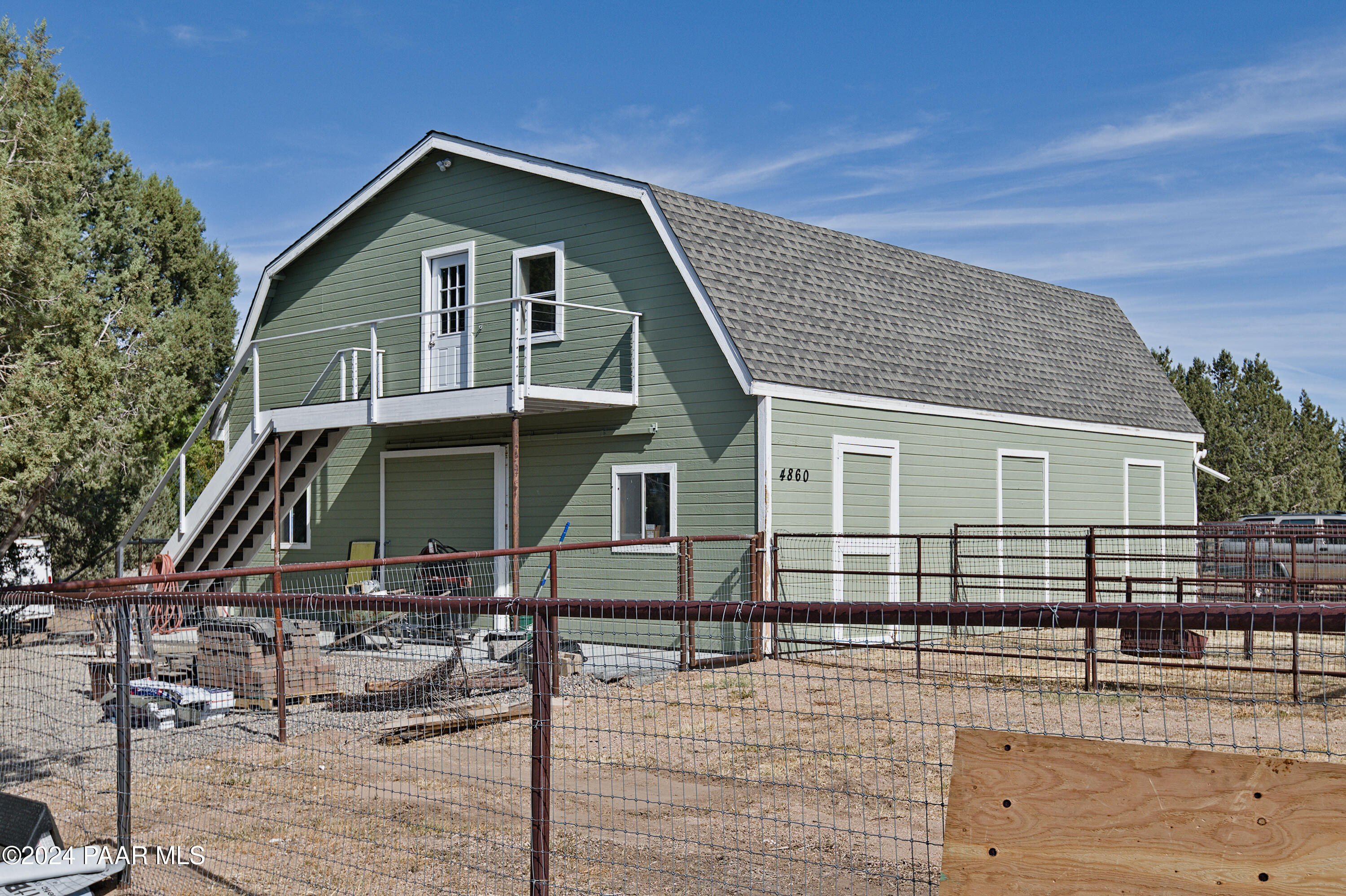 4860 West Stazenski Road Prescott, AZ 86305 - Photo 44 of 67 a front view of a house with garage