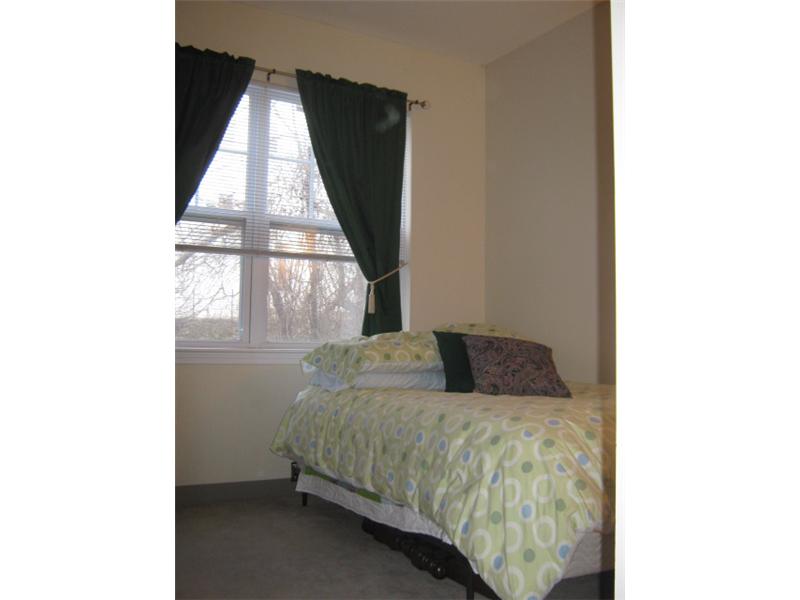 120 Mill Street, Unit 102 Woonsocket, RI 02895 - Photo 8 of 9 Bedroom.