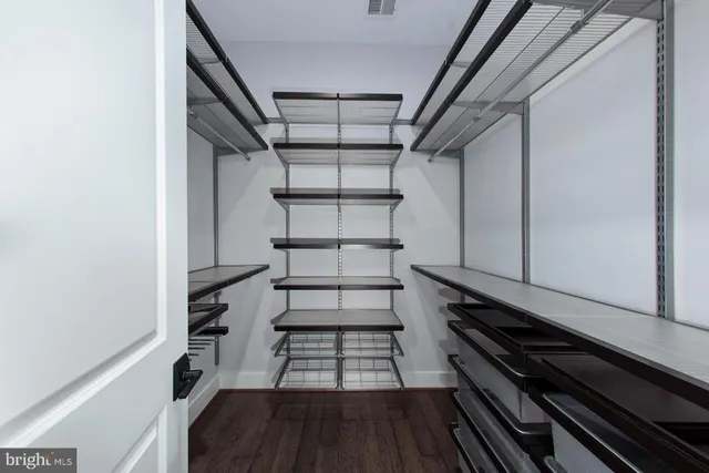 a view of a room with racks on the wall