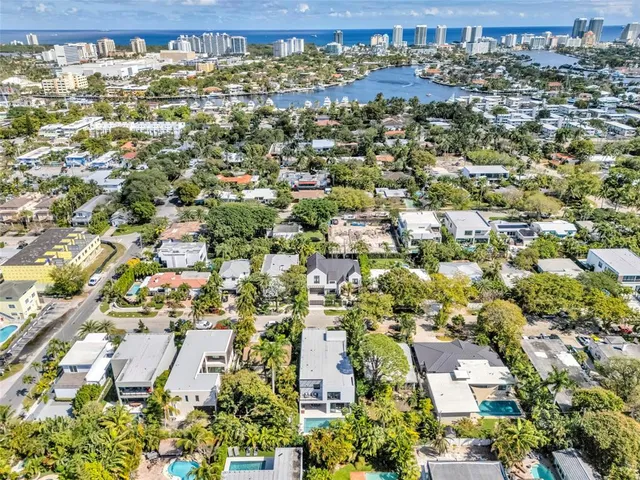 a view of a chair and table in the garden
