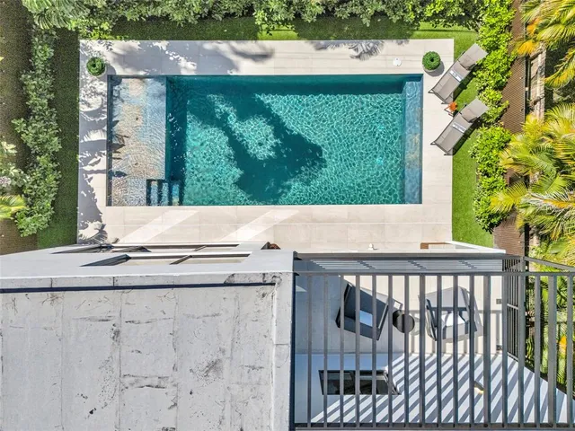 a kitchen with stainless steel appliances kitchen island a large island in the center