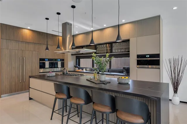 a bathroom with a sink mirror and toilet