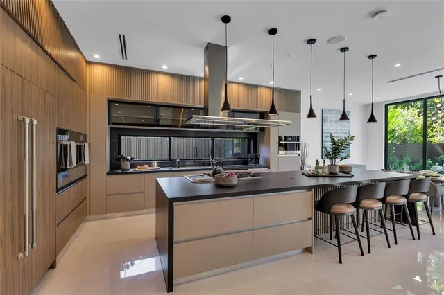 a living room with a window and a table