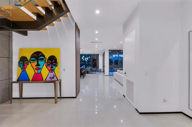 a view of a patio with dining table and chairs
