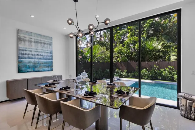 a bedroom with a bed and a flat tv screen