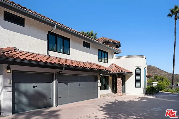 a view of a house with a balcony