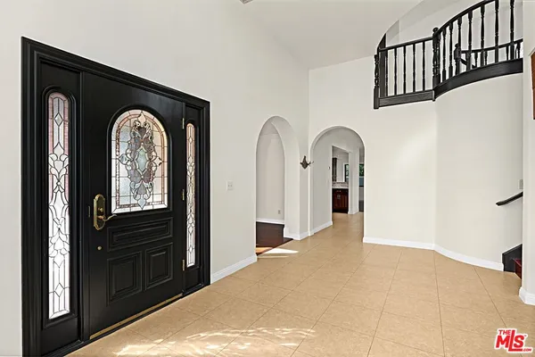 a view of entryway with a front door