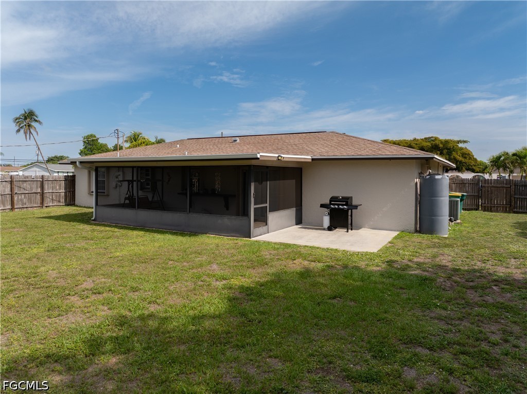 4960 20th Place Southwest Naples, FL 34116 - Photo 26 of 33 a view of a house with backyard porch and furniture