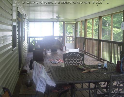 100 Hurricane Road Elkview, WV 25071 - Photo 3 of 8 Exterior Front. 45 foot screened porch overlooking rear gardens & brook