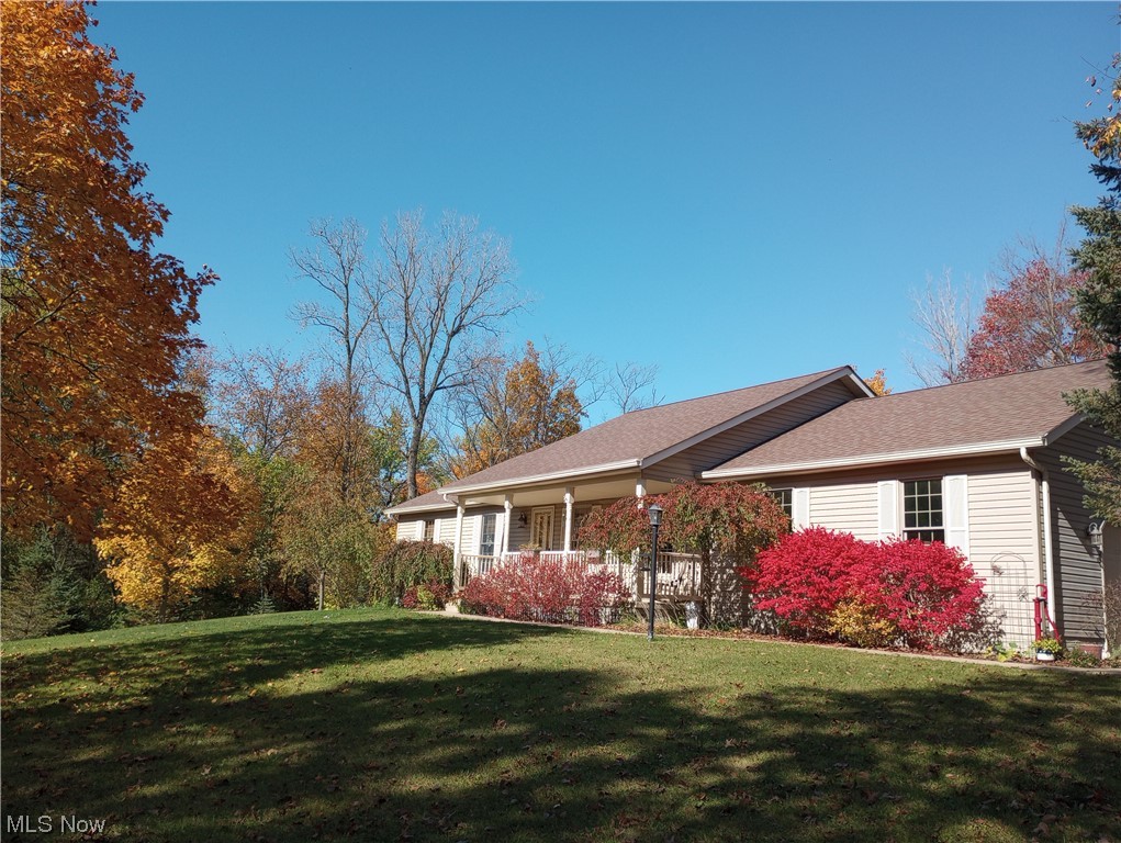 38726 Smith Road Litchfield, OH 44253 - Photo 1 of 32 Fall time with changing leaves