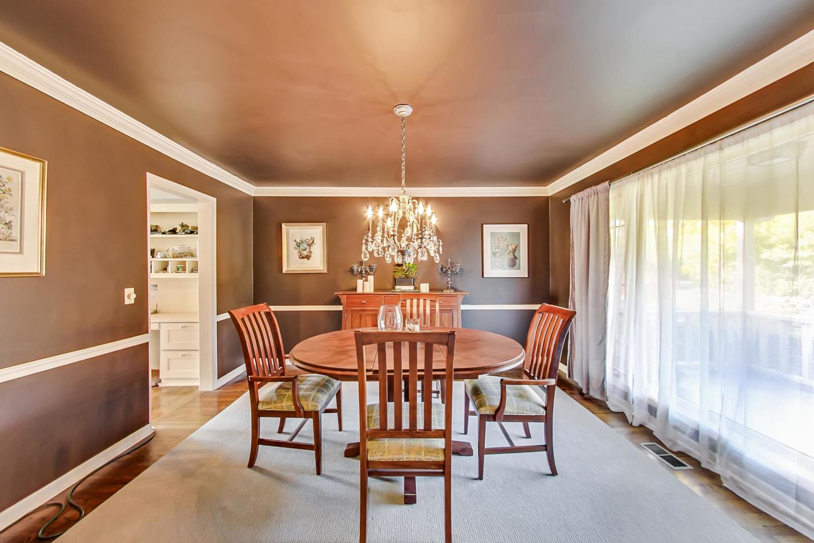 945 South Ridge Road Lake Forest, IL 60045 - Photo 8 of 36 a dining room with furniture and window