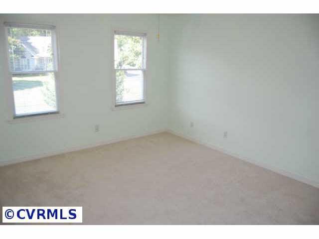 11905 Taplow Road Midlothian, VA 23112 - Photo 6 of 10 a view of an empty room and window