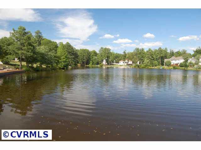 11905 Taplow Road Midlothian, VA 23112 - Photo 10 of 10 a view of a lake with a city