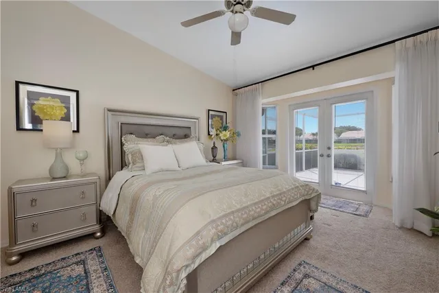 a bathroom with a granite countertop sink a large mirror and a shower
