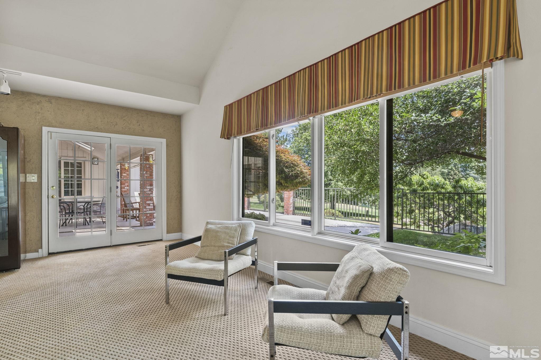 2650 Spinnaker Drive Reno, NV 89519 - Photo 14 of 40 a living room with furniture and a window
