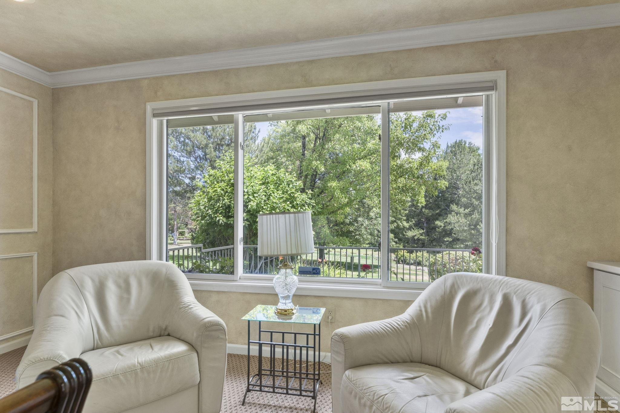 2650 Spinnaker Drive Reno, NV 89519 - Photo 19 of 40 a living room with furniture and a large window