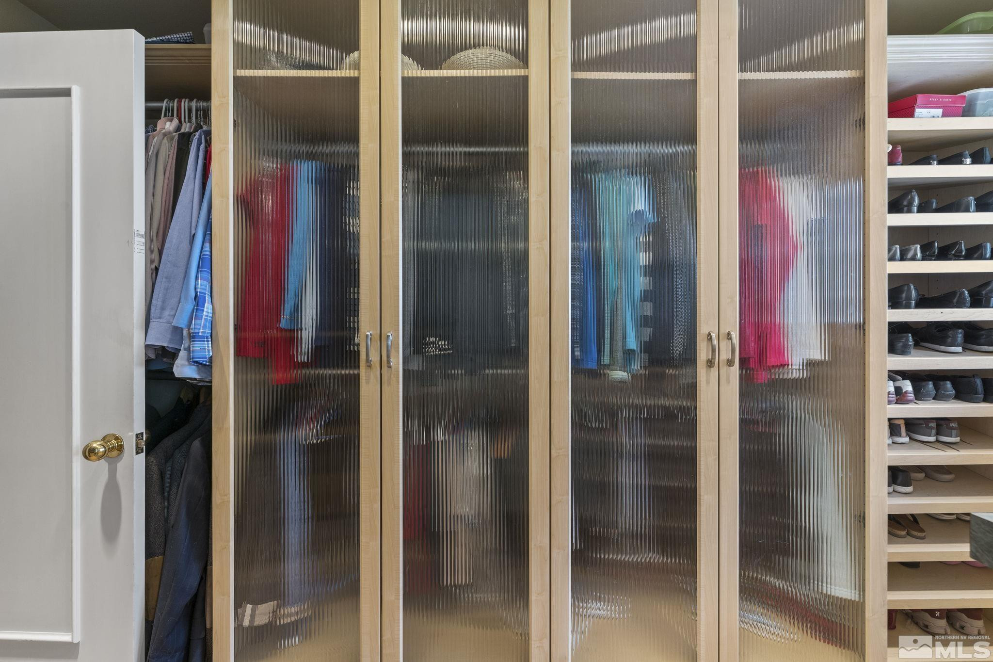 2650 Spinnaker Drive Reno, NV 89519 - Photo 22 of 40 a bathroom with a glass shower door