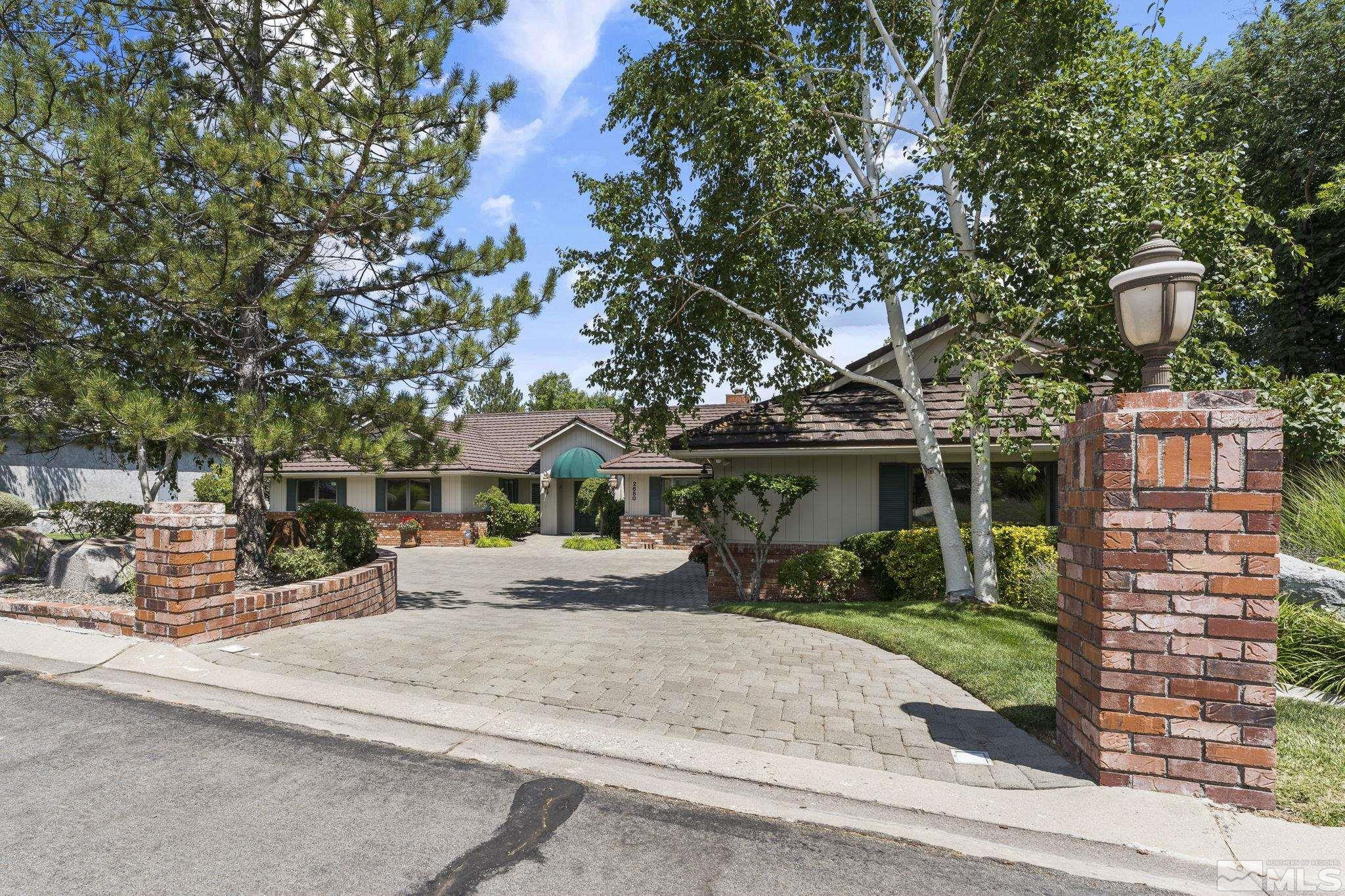 2650 Spinnaker Drive Reno, NV 89519 - Photo 3 of 40 front view of a house with a patio