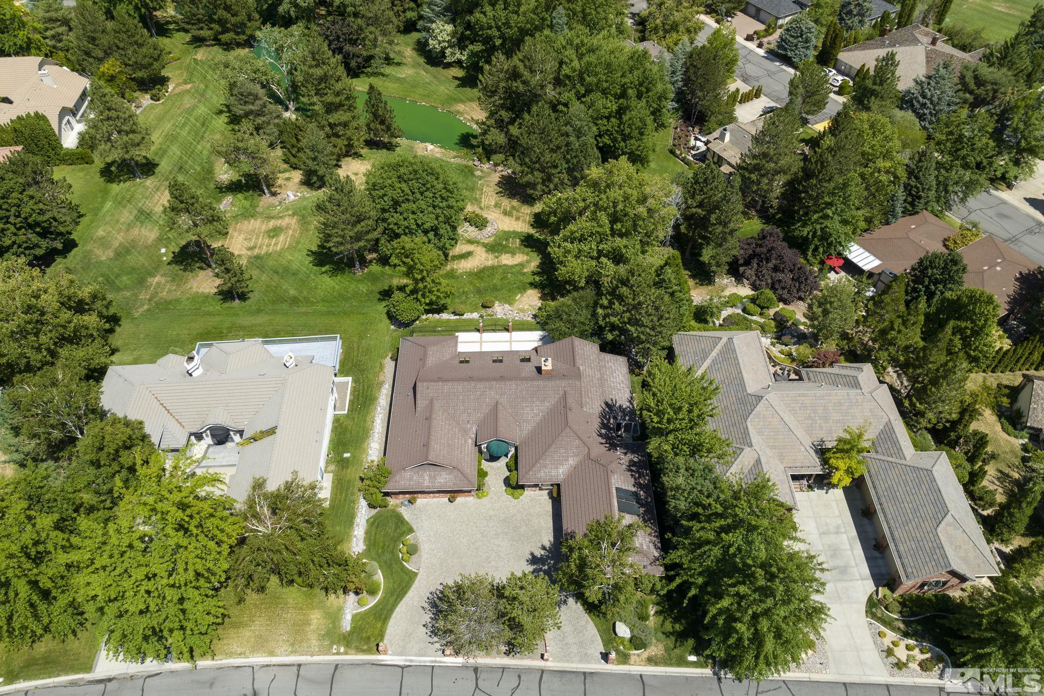 2650 Spinnaker Drive Reno, NV 89519 - Photo 35 of 40 an aerial view of a house with outdoor space and street view