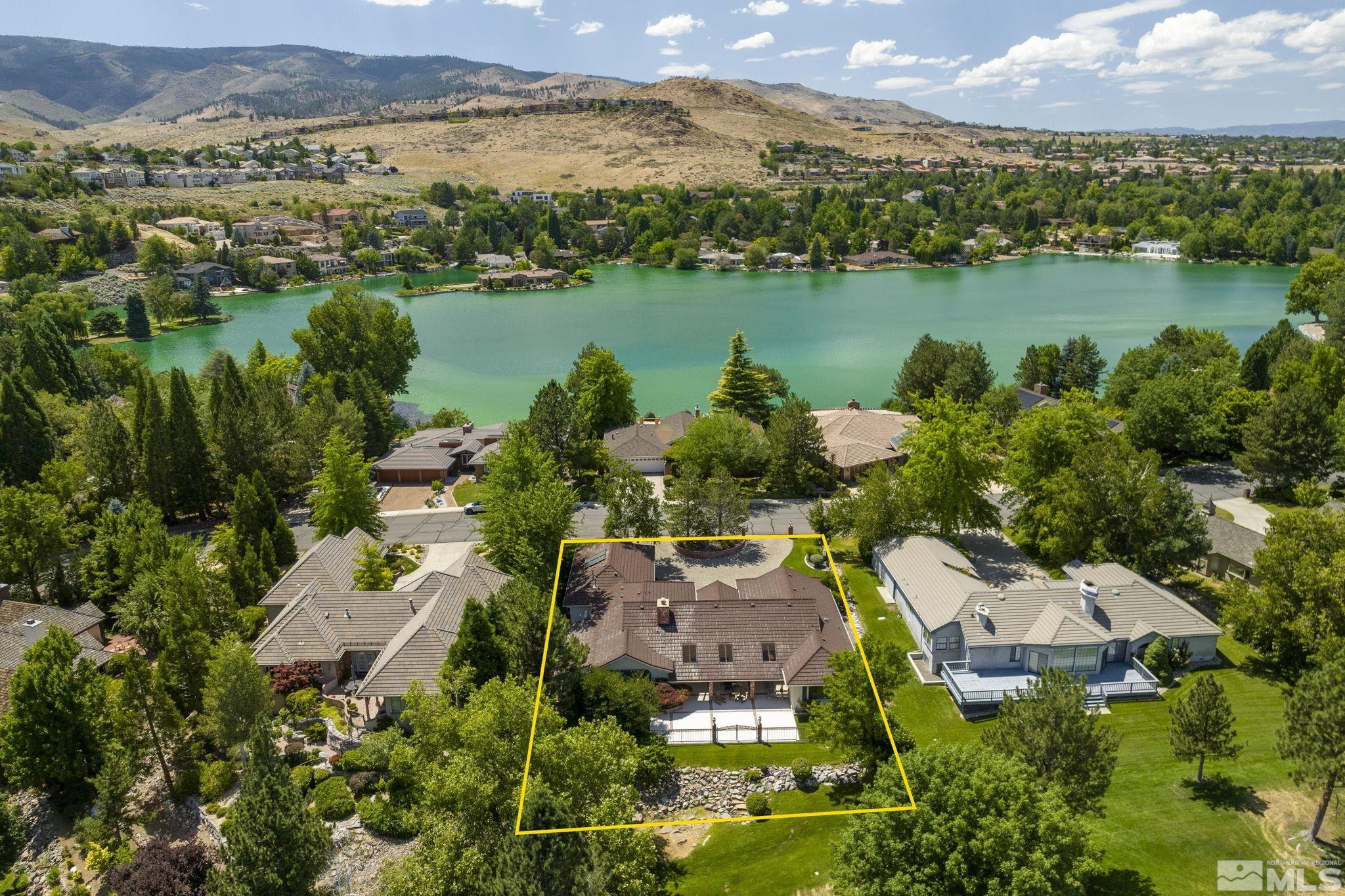 2650 Spinnaker Drive Reno, NV 89519 - Photo 36 of 40 an aerial view of lake and residential houses with outdoor space