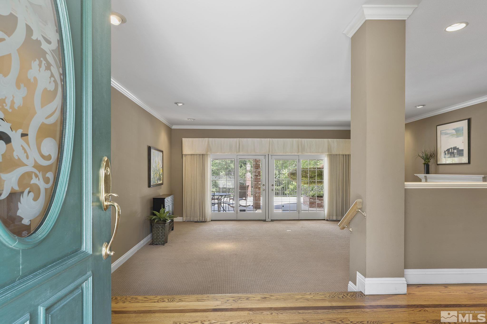 2650 Spinnaker Drive Reno, NV 89519 - Photo 4 of 40 a living room with a couch and a window