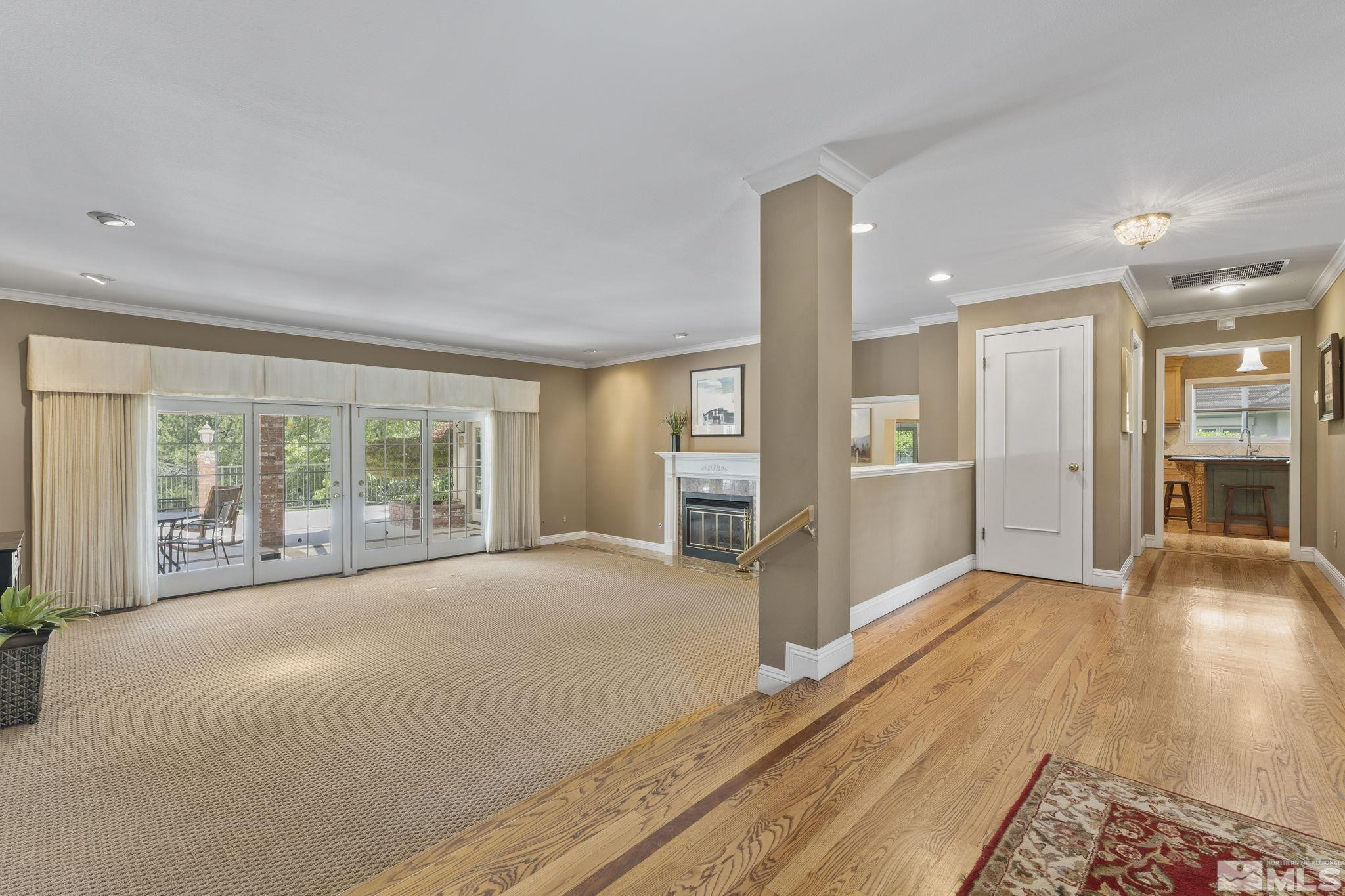 2650 Spinnaker Drive Reno, NV 89519 - Photo 5 of 40 a view of a big room with wooden floor and windows