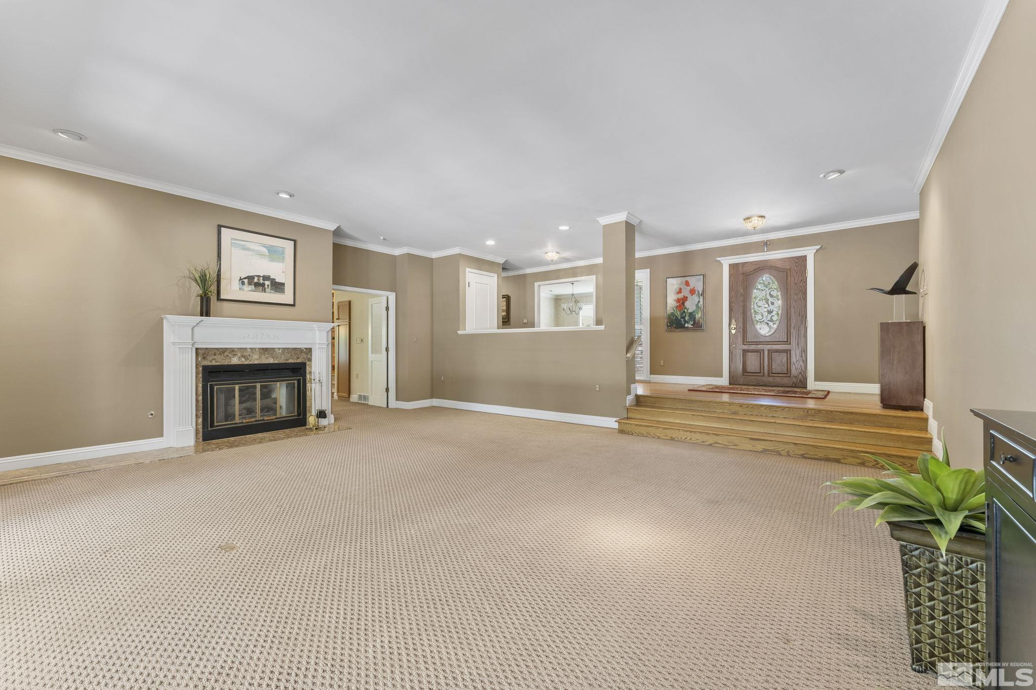 2650 Spinnaker Drive Reno, NV 89519 - Photo 7 of 40 a view of a livingroom with an empty space and a fireplace