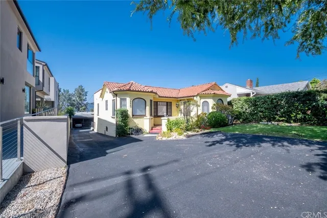 a view of a house with a patio