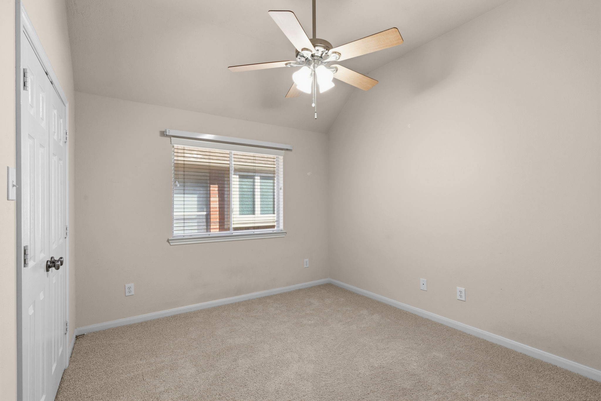 9122 Sunny Ridge Drive Houston, TX 77095 - Photo 10 of 15 an empty room with a window