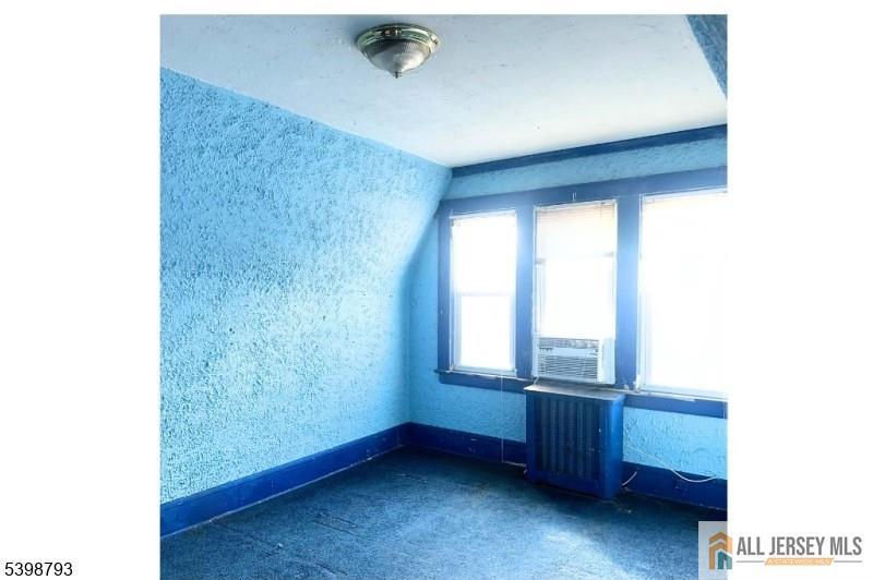 21 Robertson Road West Orange, NJ 07052 - Photo 7 of 7 a view of an empty room and window