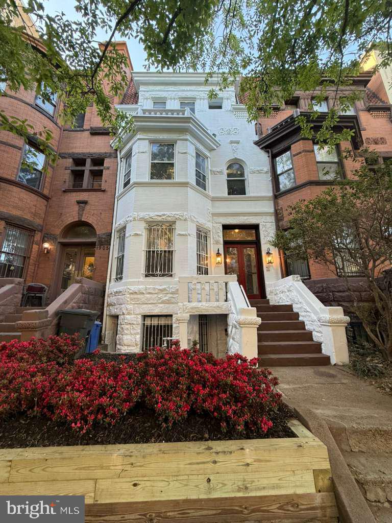 1903 Kalorama Road Northwest Washington, DC 20009 - Photo 1 of 1 Charming urban residence with vibrant blooms.