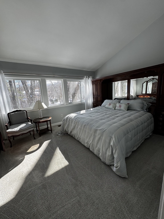 255 North Road, Unit 44 Chelmsford, MA 01824 - Photo 11 of 31 a bedroom with a bed couch and a large window