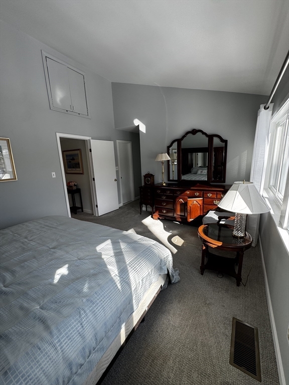 255 North Road, Unit 44 Chelmsford, MA 01824 - Photo 15 of 31 a bedroom with bed and a view of bedroom