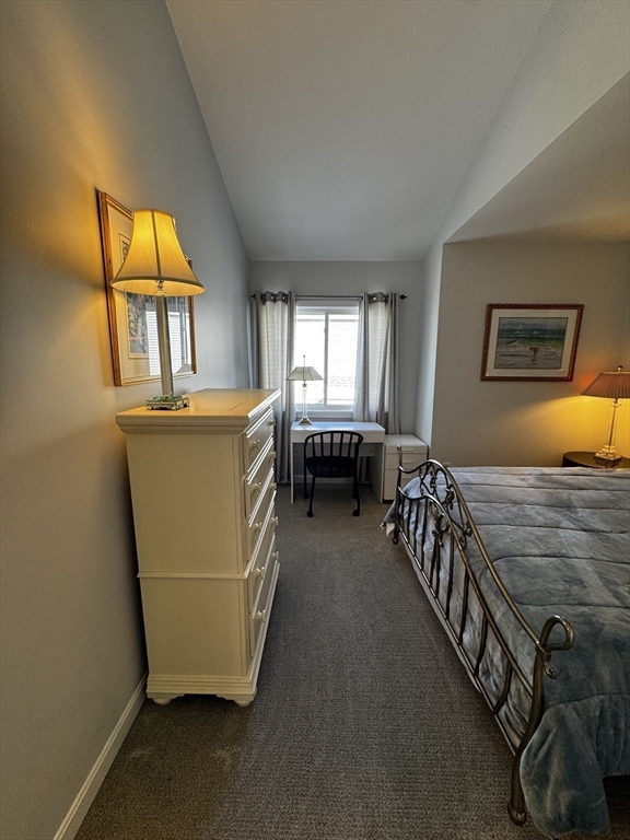 255 North Road, Unit 44 Chelmsford, MA 01824 - Photo 18 of 31 a living room with furniture and a chandelier