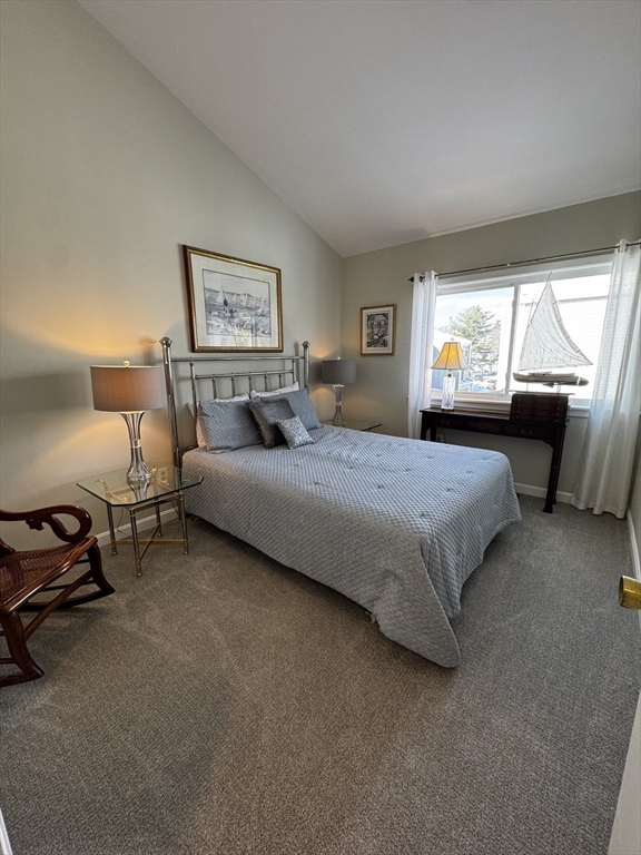 255 North Road, Unit 44 Chelmsford, MA 01824 - Photo 22 of 31 a bedroom with a bed and a couch