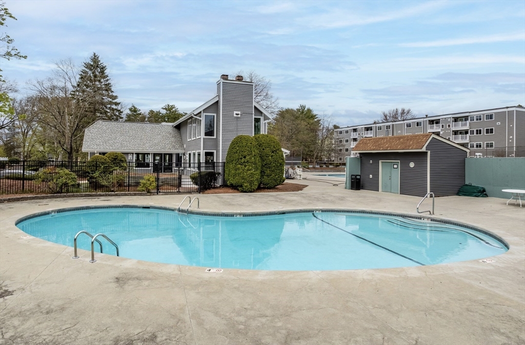 255 North Road, Unit 44 Chelmsford, MA 01824 - Photo 29 of 31 an outdoor space with pool and furniture