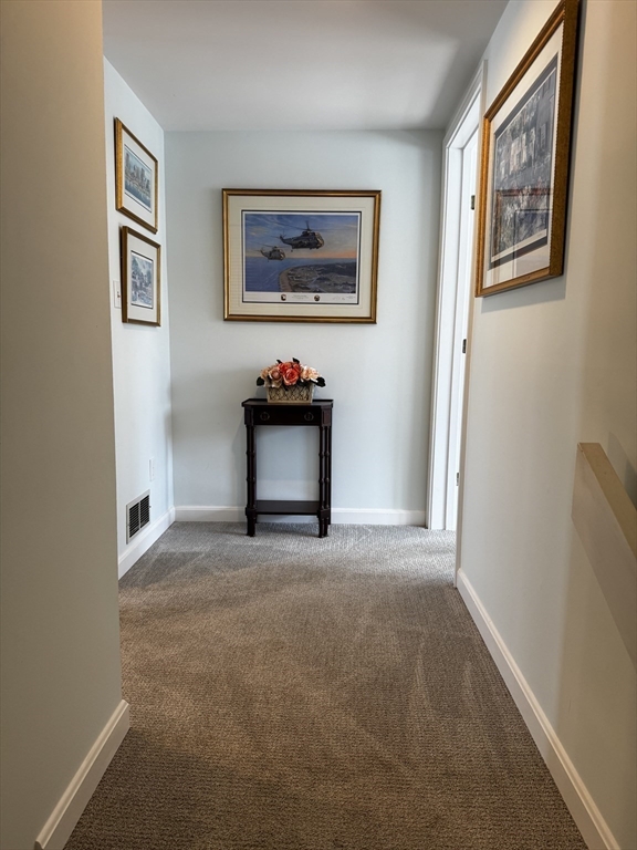 255 North Road, Unit 44 Chelmsford, MA 01824 - Photo 7 of 31 a view of livingroom with painting on the wall and a window