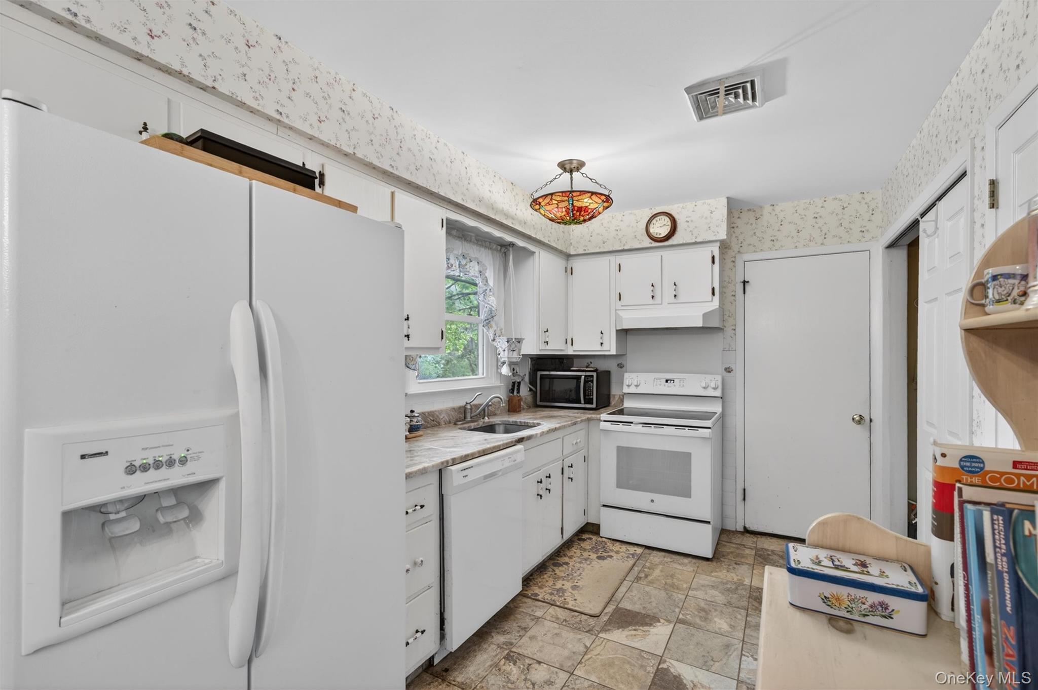 20 Oneil Circle Monroe, NY 10950 - Photo 11 of 45 White Cabinetry, Granite Countertops and Ceramic Flooring