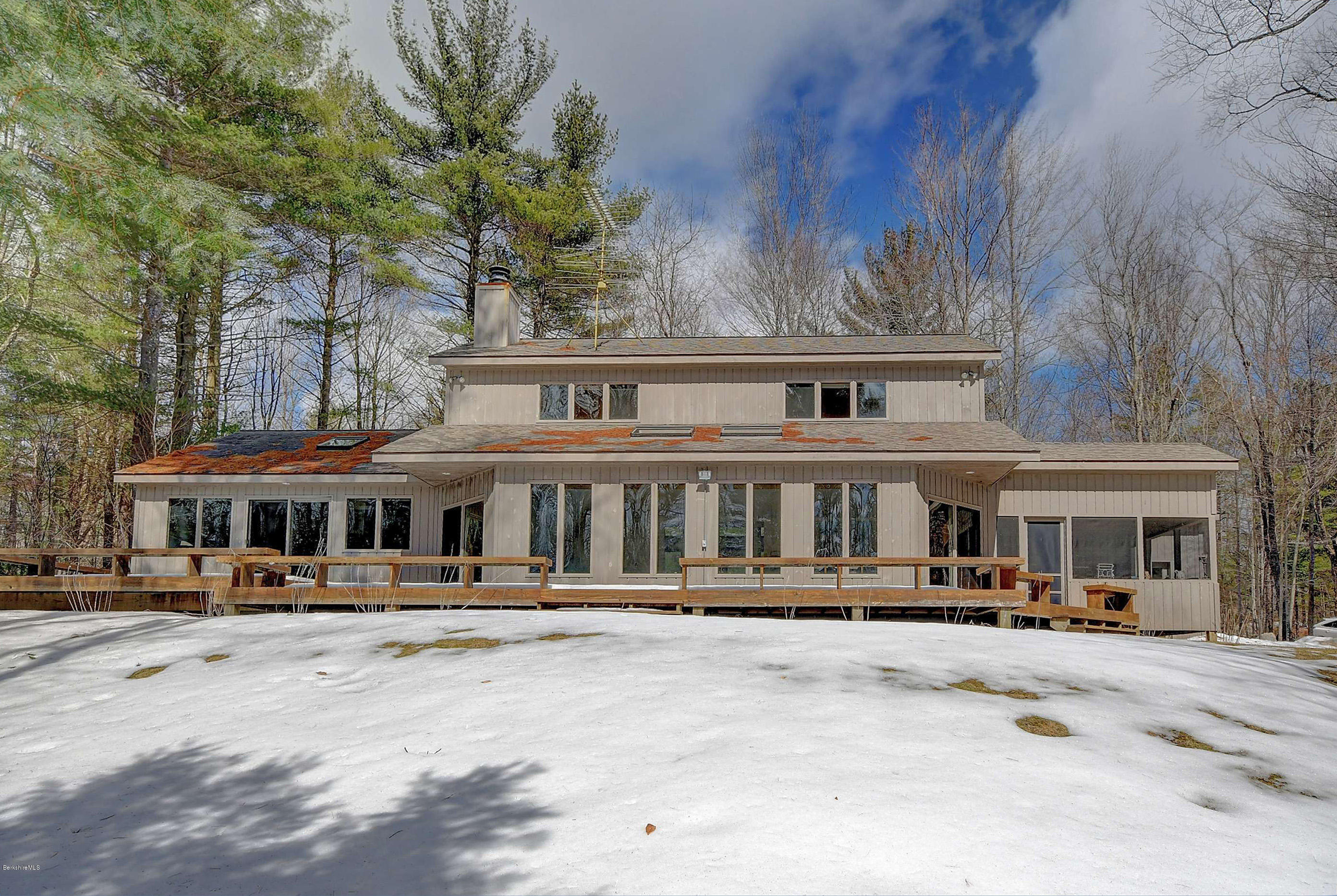 15 Bliven Road Otis, MA 01253 - Photo 1 of 30 a front view of a building with street view