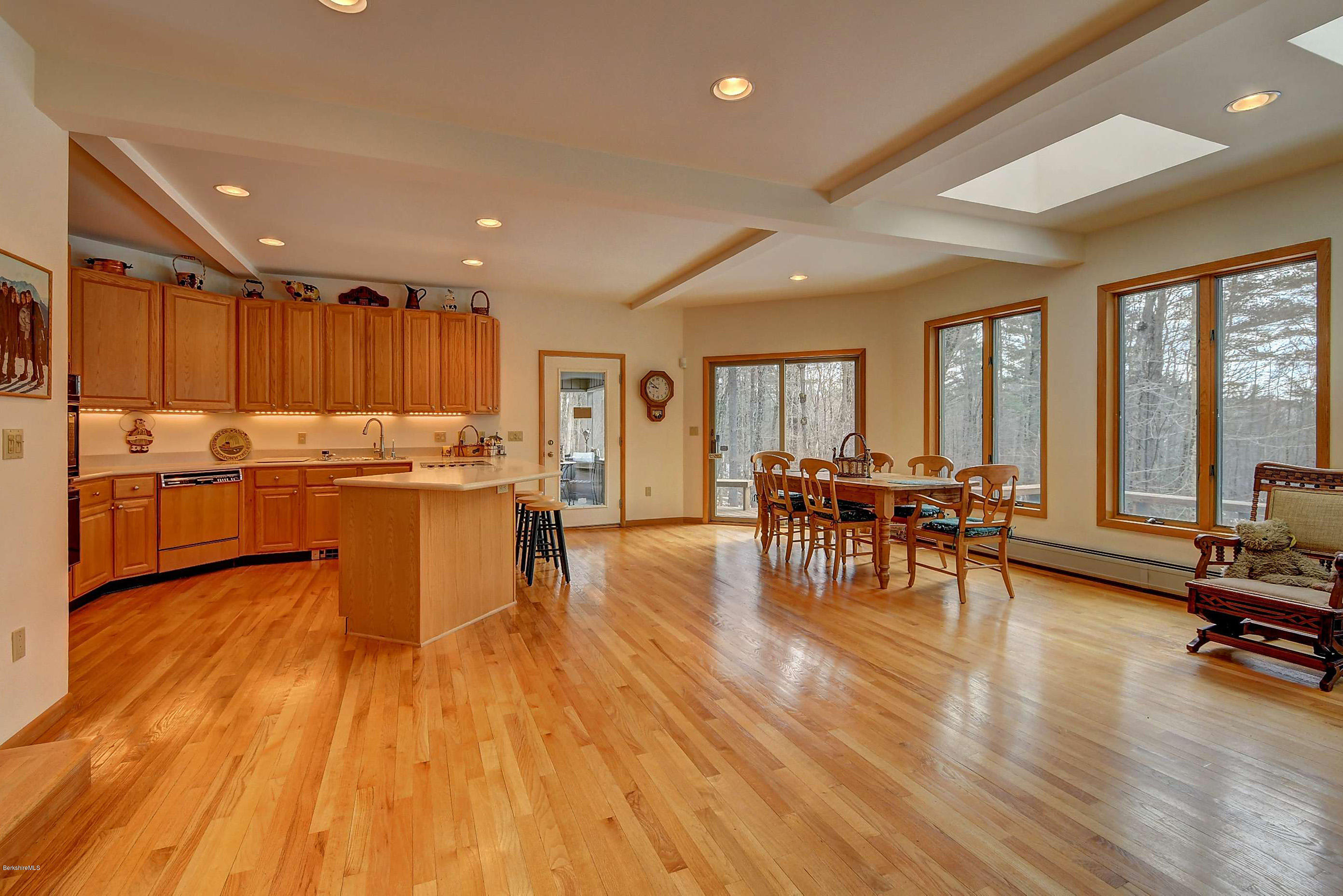 15 Bliven Road Otis, MA 01253 - Photo 11 of 30 a living room with stainless steel appliances dining table furniture and a large window