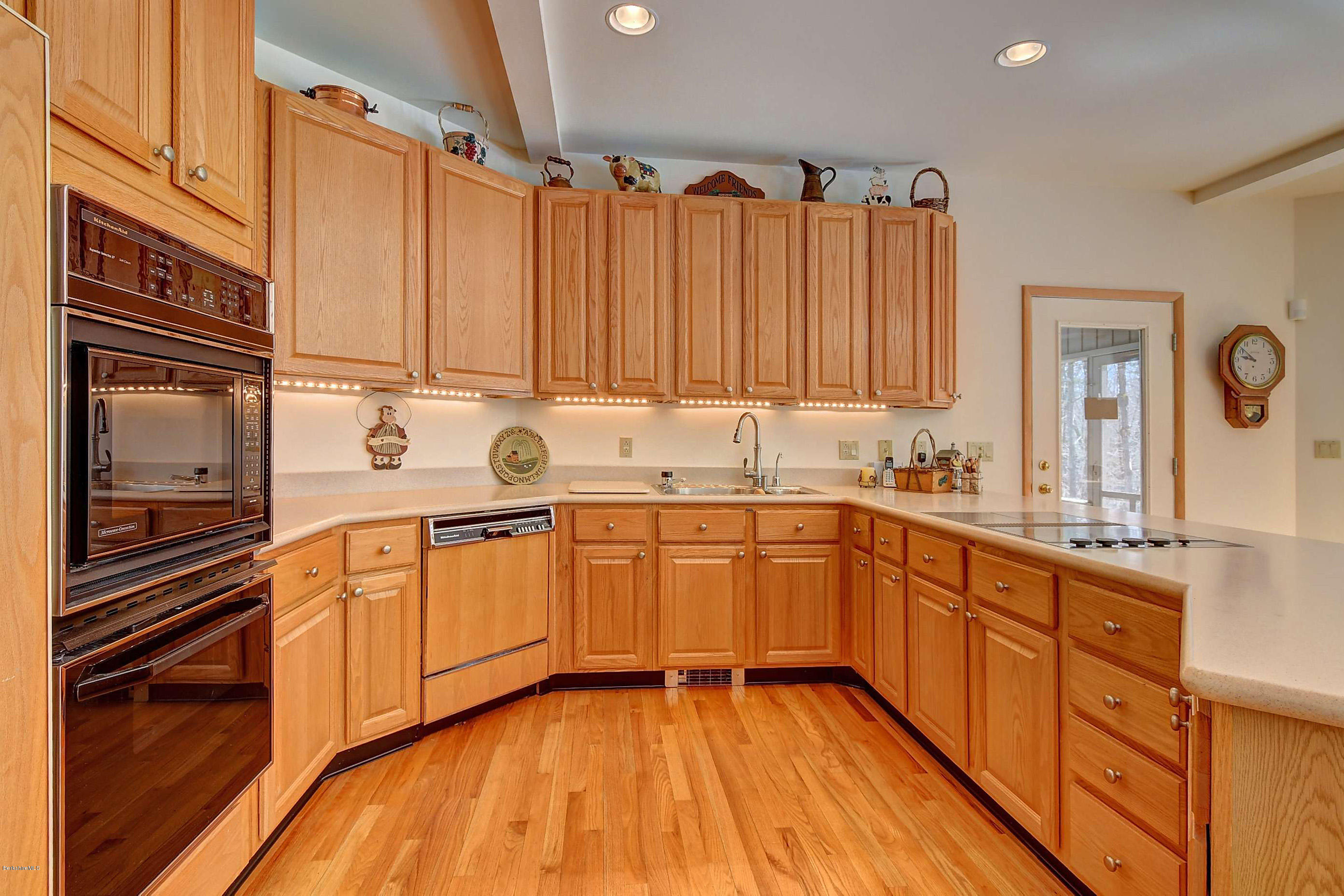 15 Bliven Road Otis, MA 01253 - Photo 13 of 30 a kitchen with stainless steel appliances granite countertop a sink and cabinets