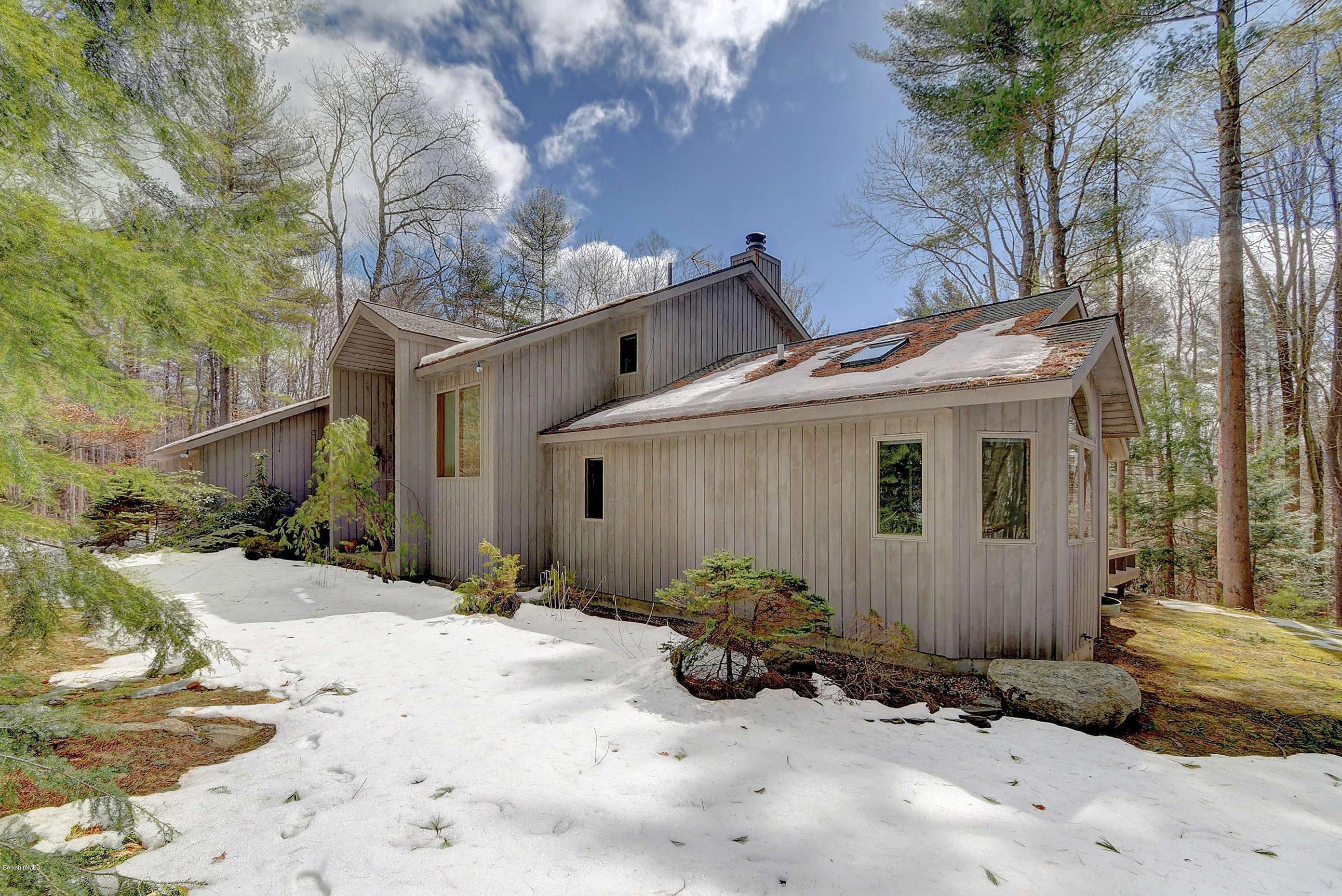 15 Bliven Road Otis, MA 01253 - Photo 3 of 30 a view of a house with a yard covered in snow