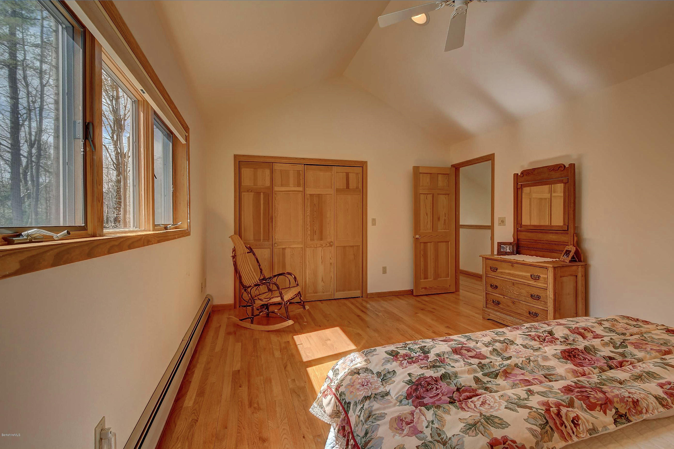 15 Bliven Road Otis, MA 01253 - Photo 22 of 30 a view of a bedroom with a bed and wooden floor