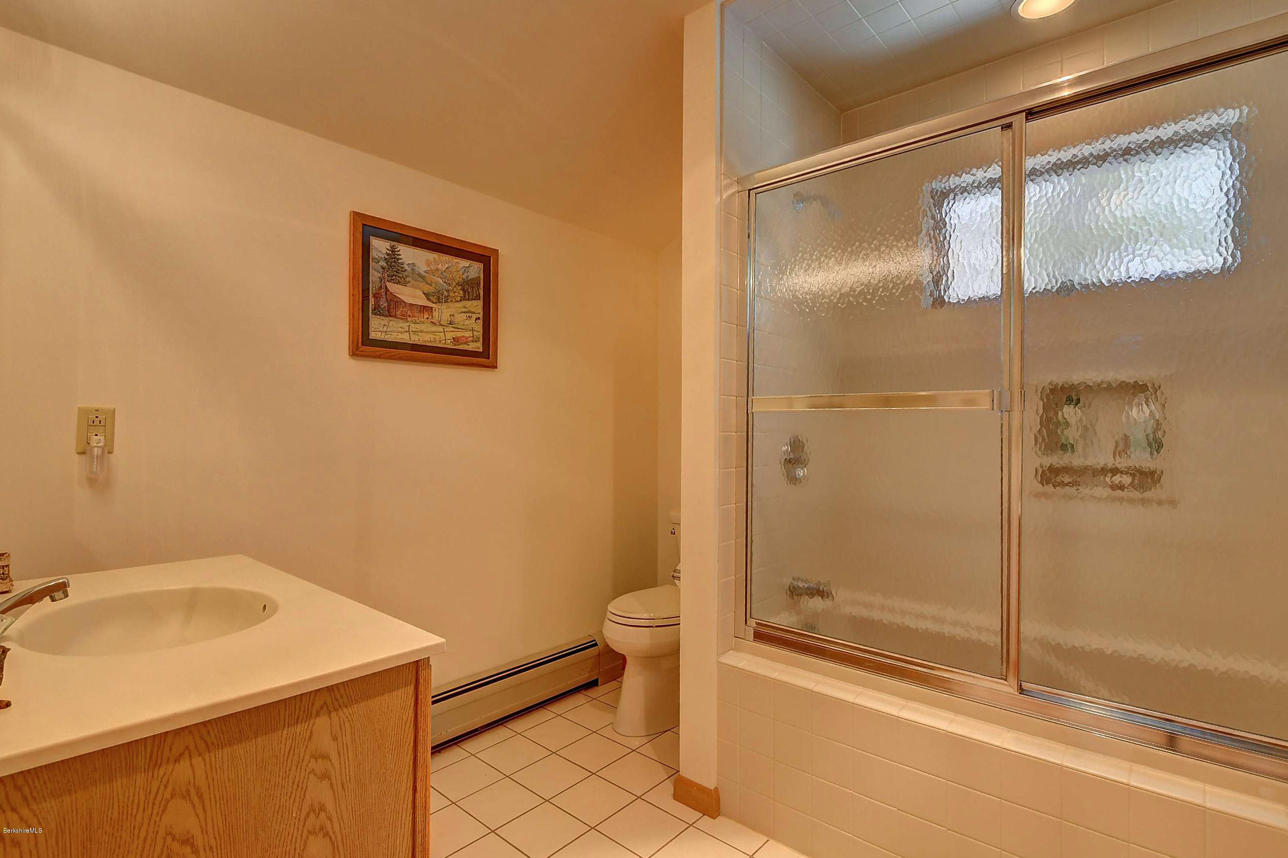15 Bliven Road Otis, MA 01253 - Photo 24 of 30 a bathroom with a sink toilet and shower