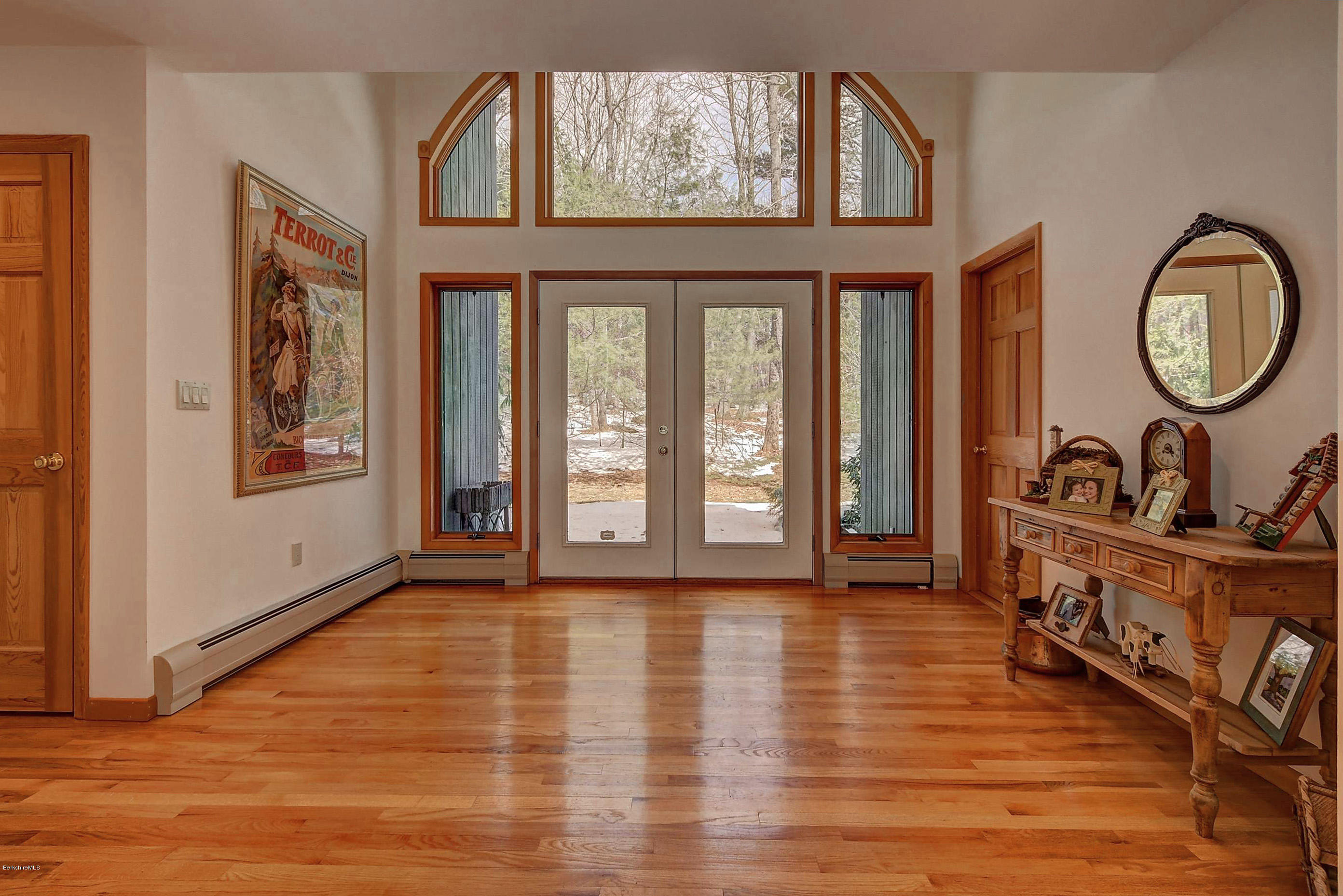 15 Bliven Road Otis, MA 01253 - Photo 4 of 30 a view of a room with wooden floor windows and a chandelier