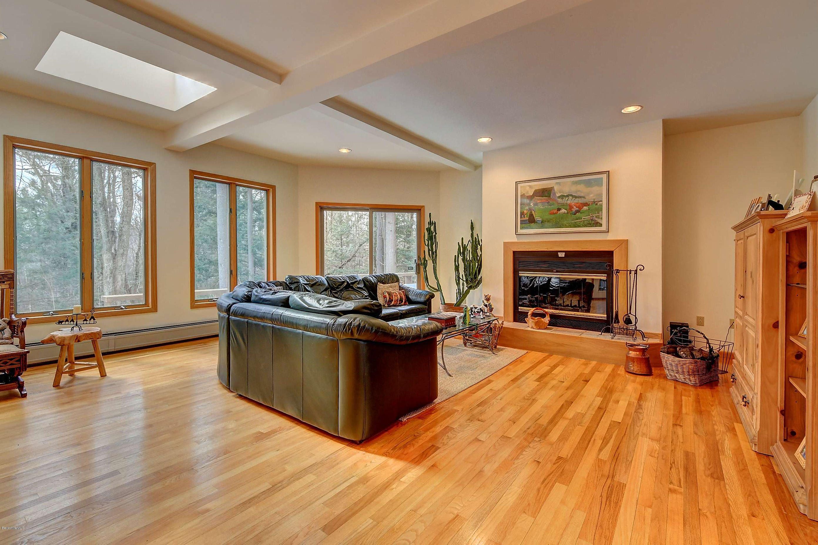 15 Bliven Road Otis, MA 01253 - Photo 6 of 30 a living room with furniture and a fireplace