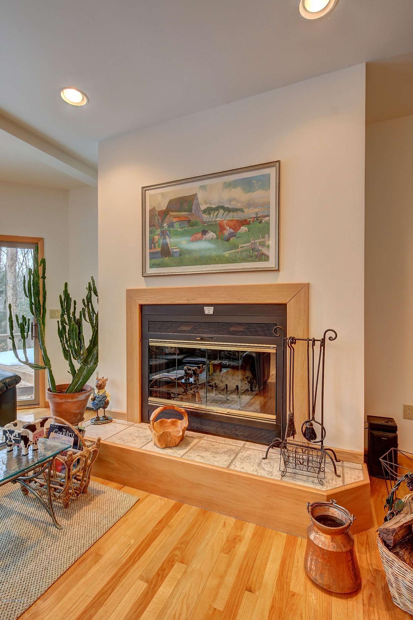 15 Bliven Road Otis, MA 01253 - Photo 8 of 30 a living room with furniture and a fireplace