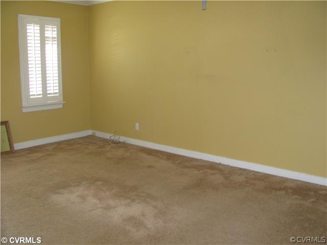 5413 Standing Oak Road Midlothian, VA 23112 - Photo 11 of 12 an empty room with a window
